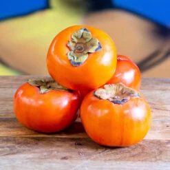 Persimmons ($10.00 P/kg)